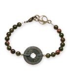 The Present with Coin Bracelet